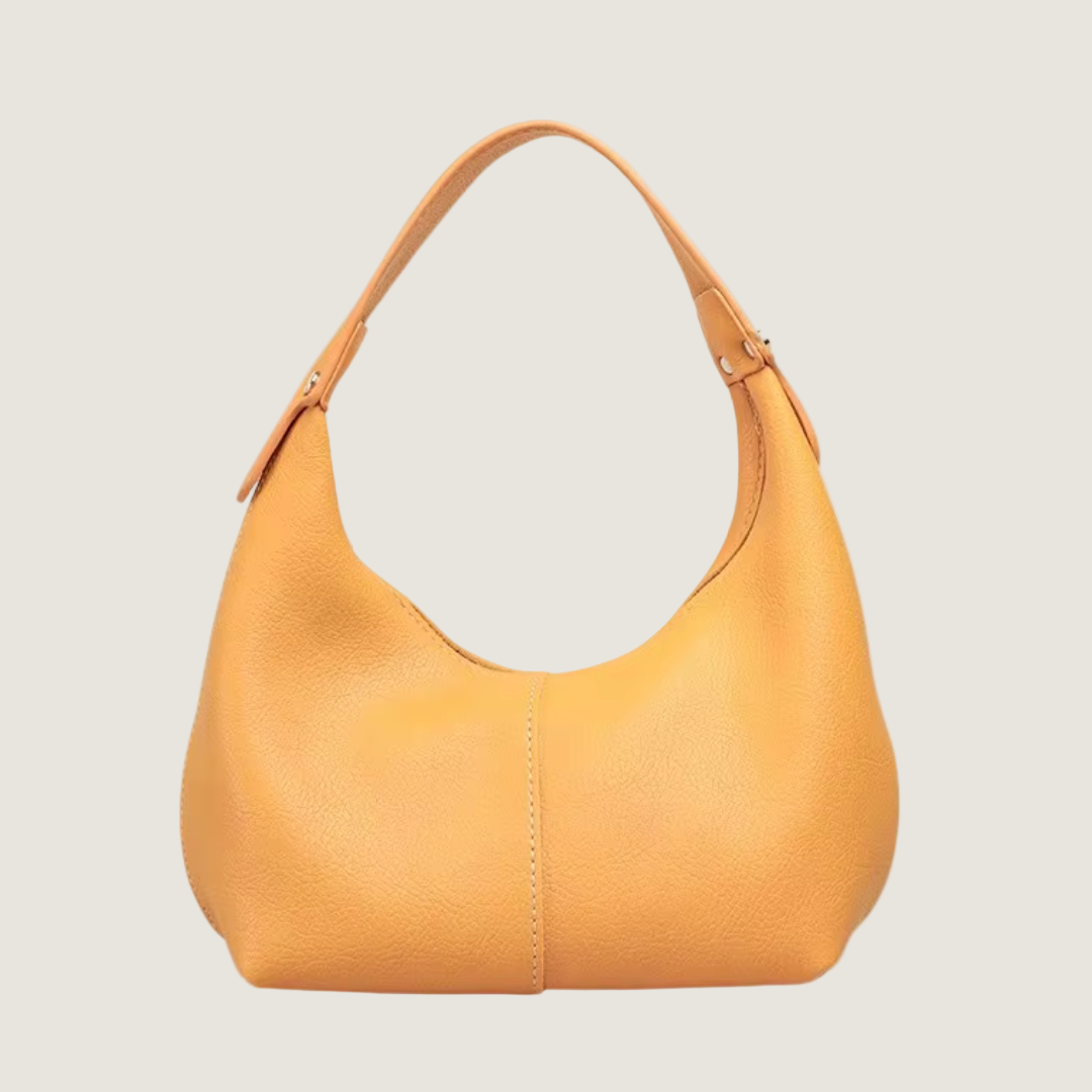 Yellow handbag on a white background