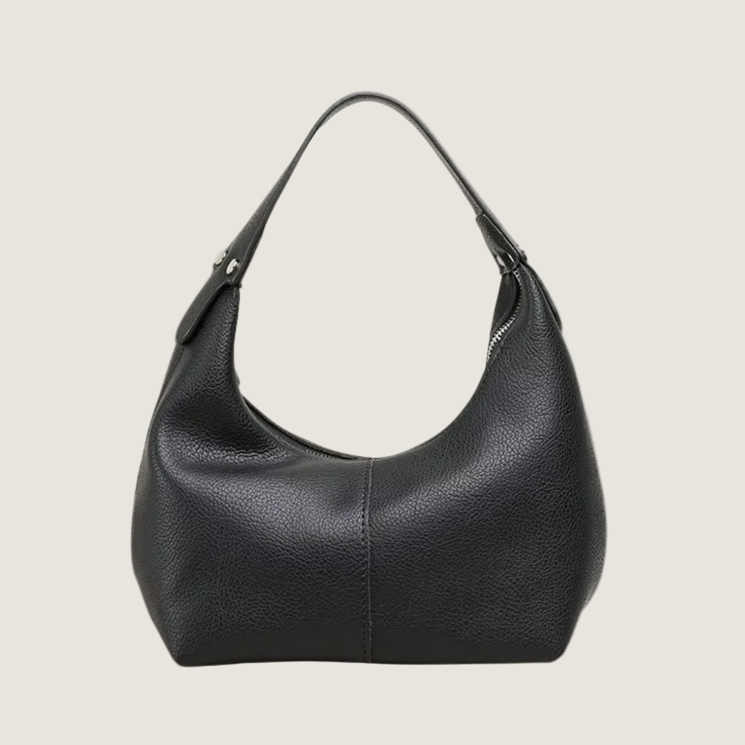 Black leather handbag on a white background