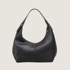 Black leather handbag on a white background