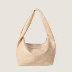 Beige handbag on a white background