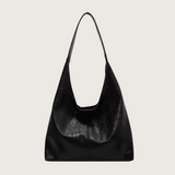 Black leather handbag on a white background