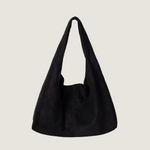 Black handbag on a white background
