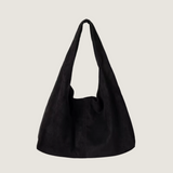 Black handbag on a white background