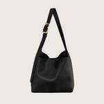 Black shoulder bag with a gold buckle on a white background