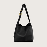 Black shoulder bag with a gold buckle on a white background